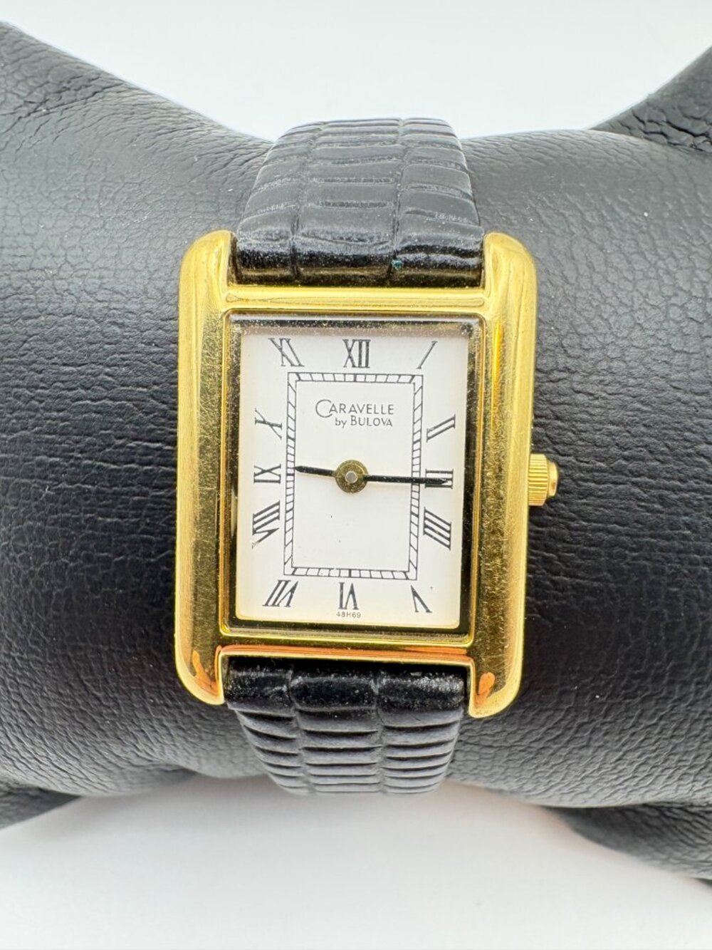 Caravelle by Bulova Vintage Tank Watch Gold Tone Roman Numerals Black Leather